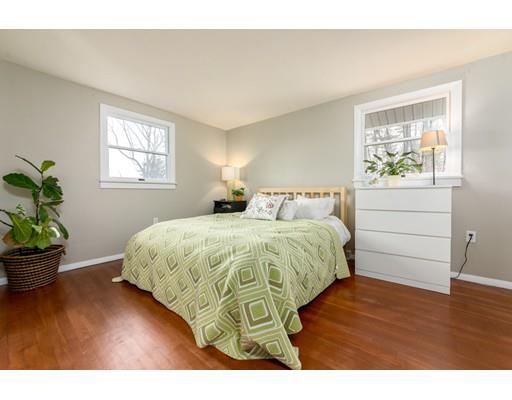 73 Woobly Road Bolton, MA 01740 - Photo 13 of 30 a bedroom with a bed and a potted plant