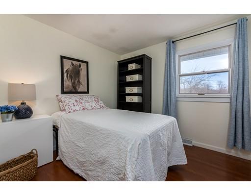 73 Woobly Road Bolton, MA 01740 - Photo 16 of 30 a bedroom with a bed and a dresser