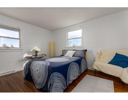 73 Woobly Road Bolton, MA 01740 - Photo 17 of 30 a bedroom with a bed and window
