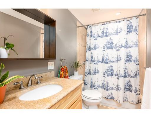73 Woobly Road Bolton, MA 01740 - Photo 18 of 30 a bathroom with a sink toilet and shower