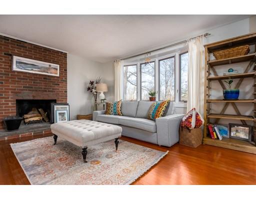 73 Woobly Road Bolton, MA 01740 - Photo 2 of 30 a living room with furniture and a fireplace