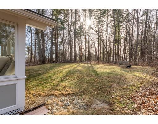 73 Woobly Road Bolton, MA 01740 - Photo 26 of 30 a view of a yard with large trees