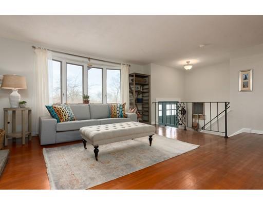 73 Woobly Road Bolton, MA 01740 - Photo 3 of 30 a living room with furniture a rug potted plant and a window