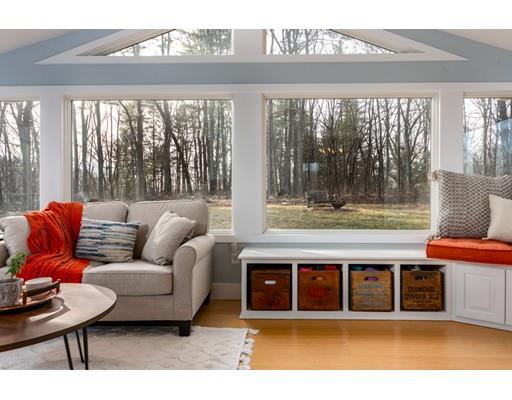 73 Woobly Road Bolton, MA 01740 - Photo 10 of 30 a living room with furniture and a large window