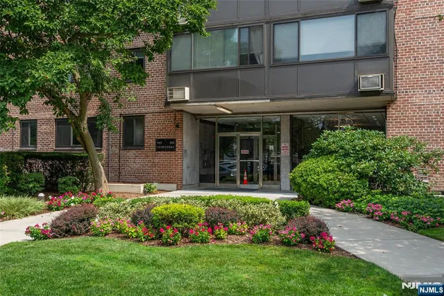 a view of a house with a garden