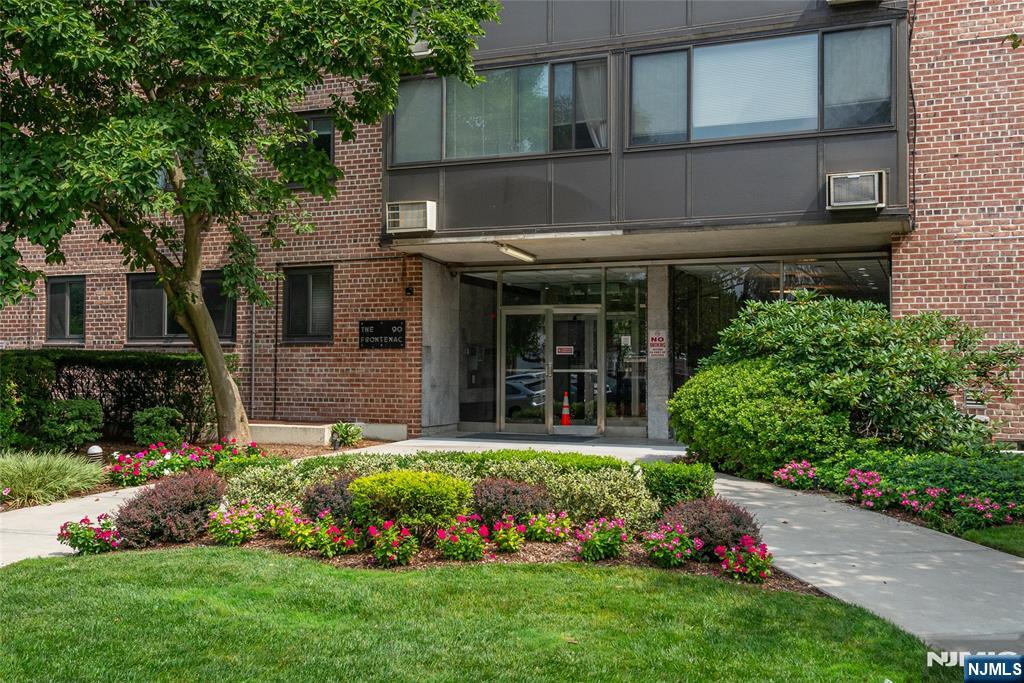 90 Prospect Avenue, Unit 10A Hackensack, NJ 07601 - Photo 2 of 35 a view of a house with a garden