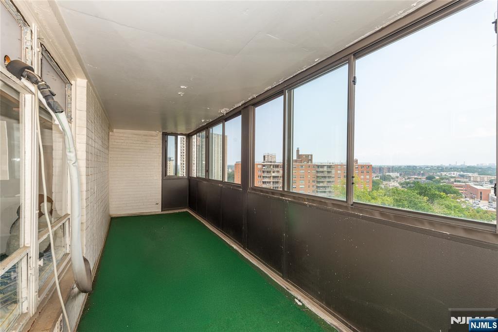 90 Prospect Avenue, Unit 10A Hackensack, NJ 07601 - Photo 29 of 35 a view of porch with a floor to ceiling window
