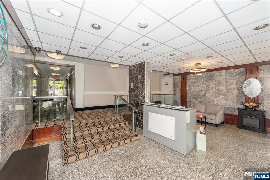 90 Prospect Avenue, Unit 10A Hackensack, NJ 07601 - Photo 32 of 35 a living room with furniture