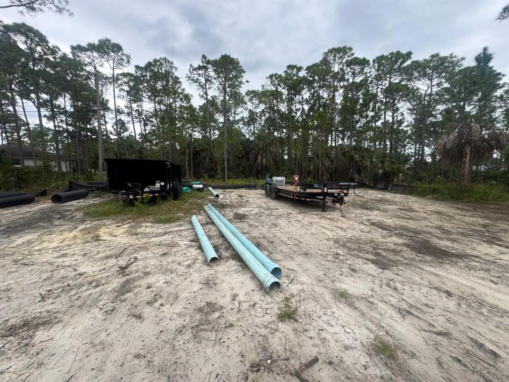 607 Reading Street Southeast Palm Bay, FL 32909 - Photo 2 of 10 a view of a park with a bench