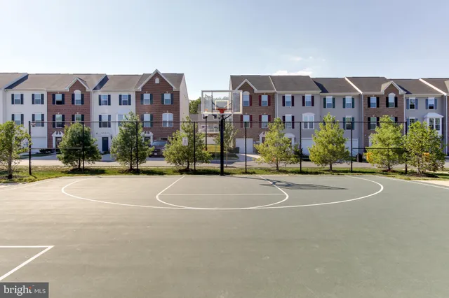 an outdoor space with seating area and garden