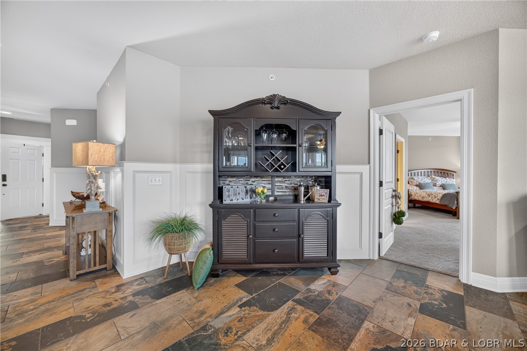 3168 Twin Rivers Point, Unit 2B Camdenton, MO 65020 - Photo 27 of 92 Dry Bar Area. Note the Lovely 4 1/2 Ft Wainscoted