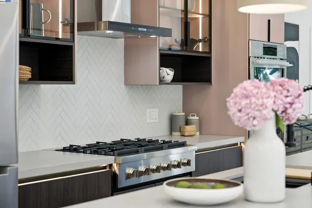 a bathroom with a sink and a large mirror