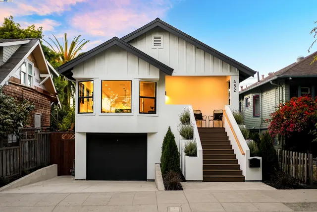 a front view of house along with stairs