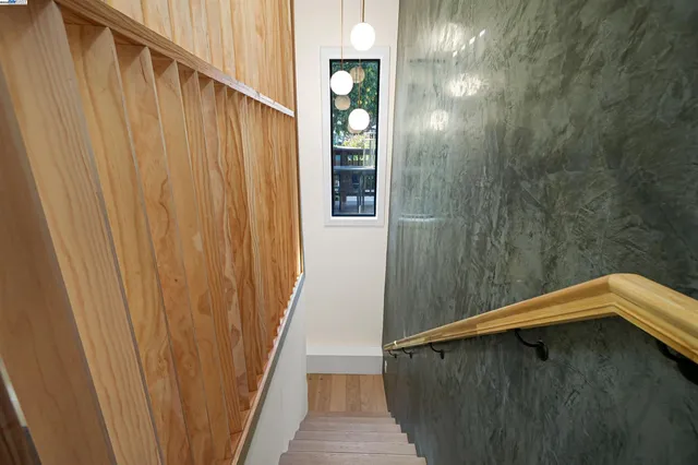 a living room with furniture window and flat screen tv