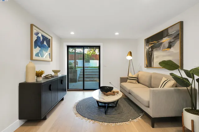 a view of a dining room with furniture and window