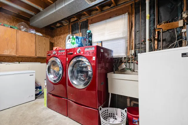 a utility room with dryer and washer
