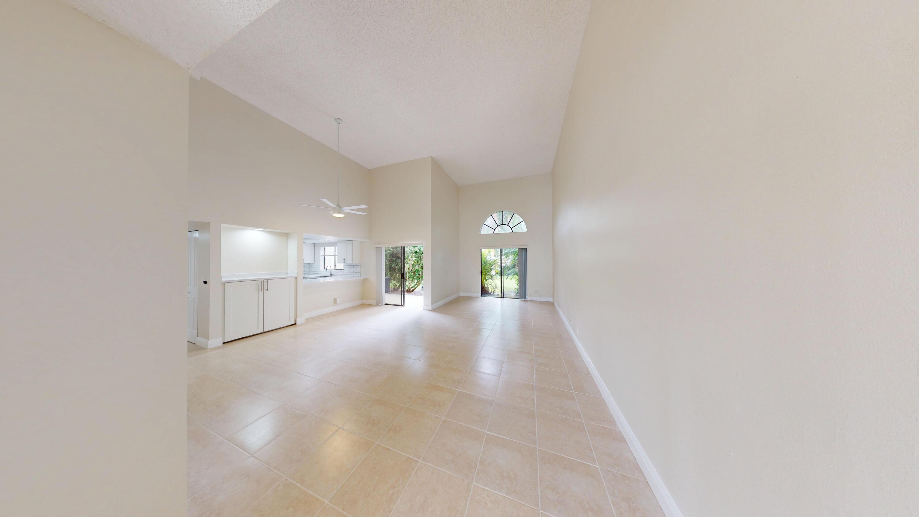 3143 Kingswood Terrace Boca Raton, FL 33431 - Photo 8 of 21 a view of a hallway with windows