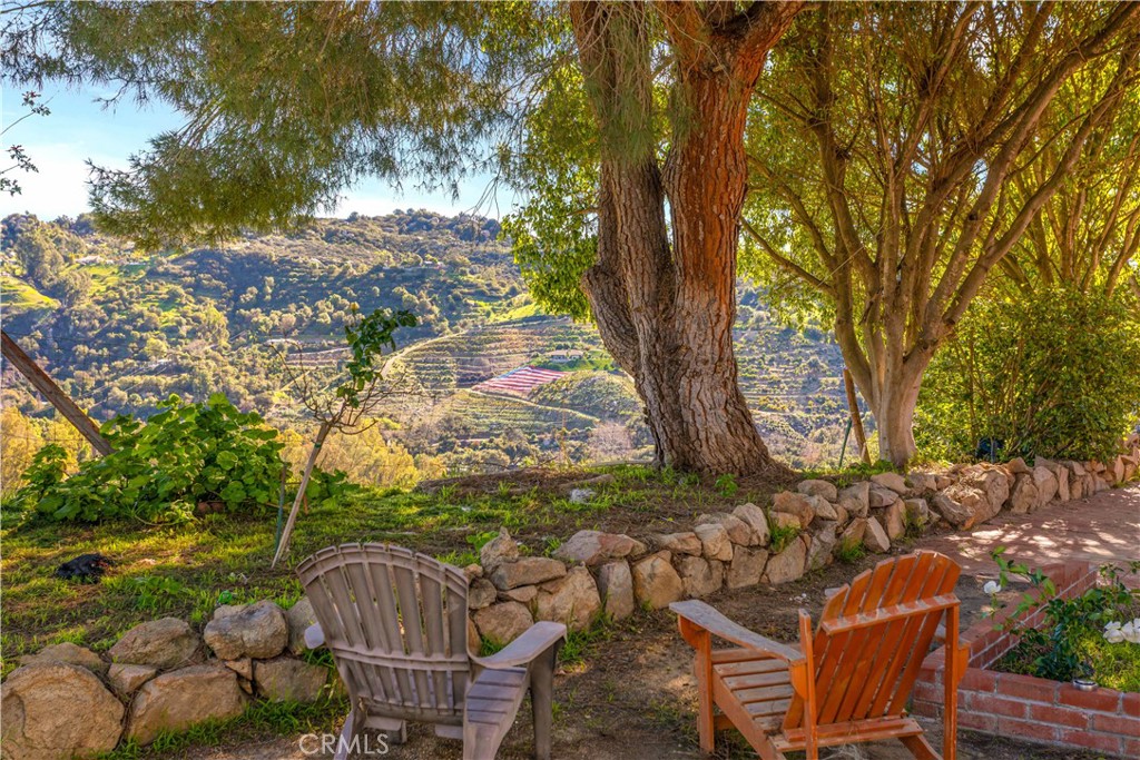 Breathtaking views from your tranquil retreat. Note the American flag across the hillside.