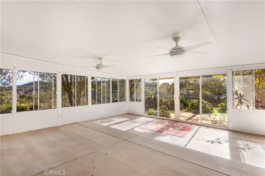 2311 Rose Road Fallbrook, CA 92028 - Photo 16 of 50 a view of an empty room with windows
