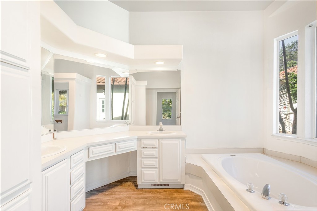 2311 Rose Road Fallbrook, CA 92028 - Photo 20 of 50 a bathroom with a tub sink and mirror