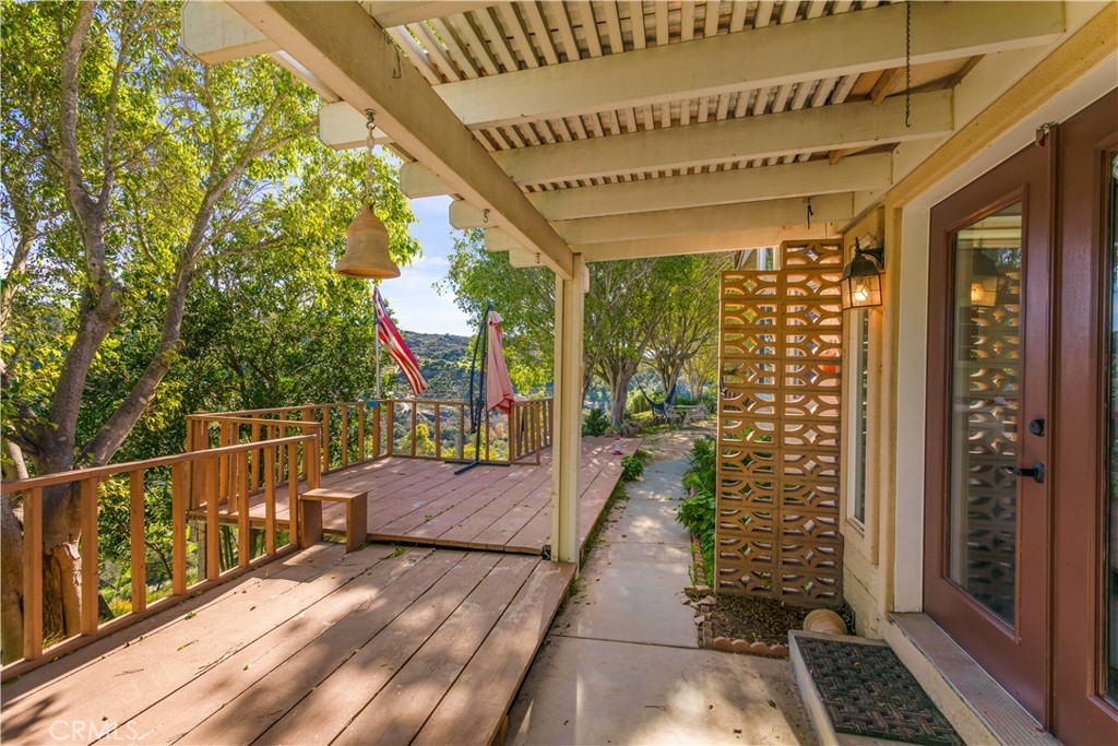 2311 Rose Road Fallbrook, CA 92028 - Photo 4 of 50 a balcony view with a glass door