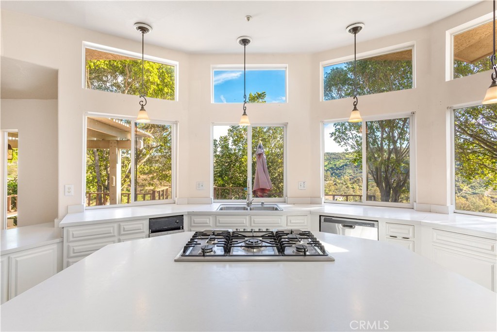 2311 Rose Road Fallbrook, CA 92028 - Photo 8 of 50 a large white kitchen with a large window