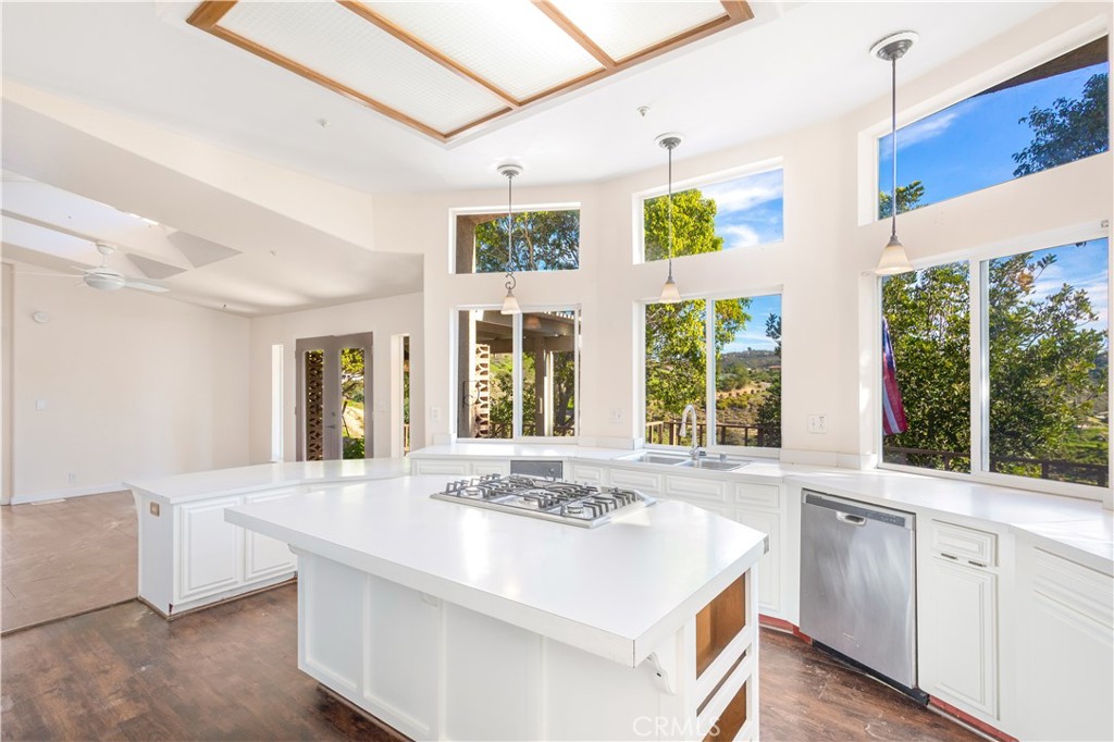 2311 Rose Road Fallbrook, CA 92028 - Photo 9 of 50 a bathroom with a granite countertop sink and large window