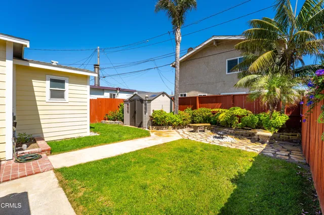 a house view with a garden space
