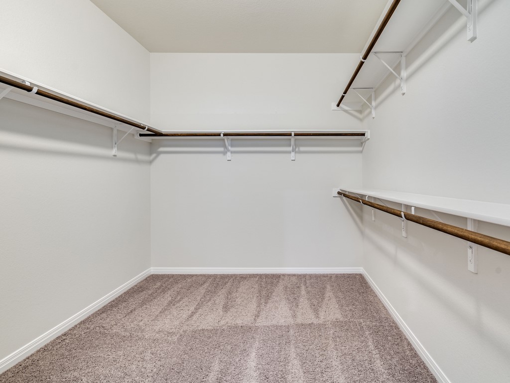 4113 Birdwatch Loop, Unit 21 Pflugerville, TX 78660 - Photo 12 of 30 a view of an empty walk in closet