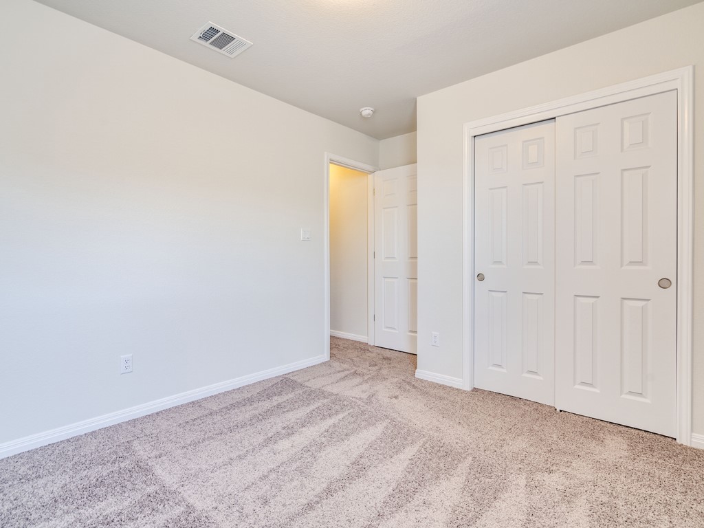 4113 Birdwatch Loop, Unit 21 Pflugerville, TX 78660 - Photo 17 of 30 a view of an empty room