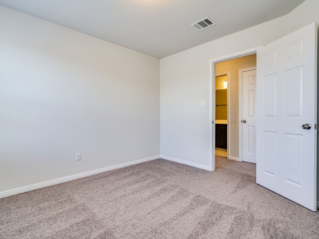 4113 Birdwatch Loop, Unit 21 Pflugerville, TX 78660 - Photo 19 of 30 a view of an empty room