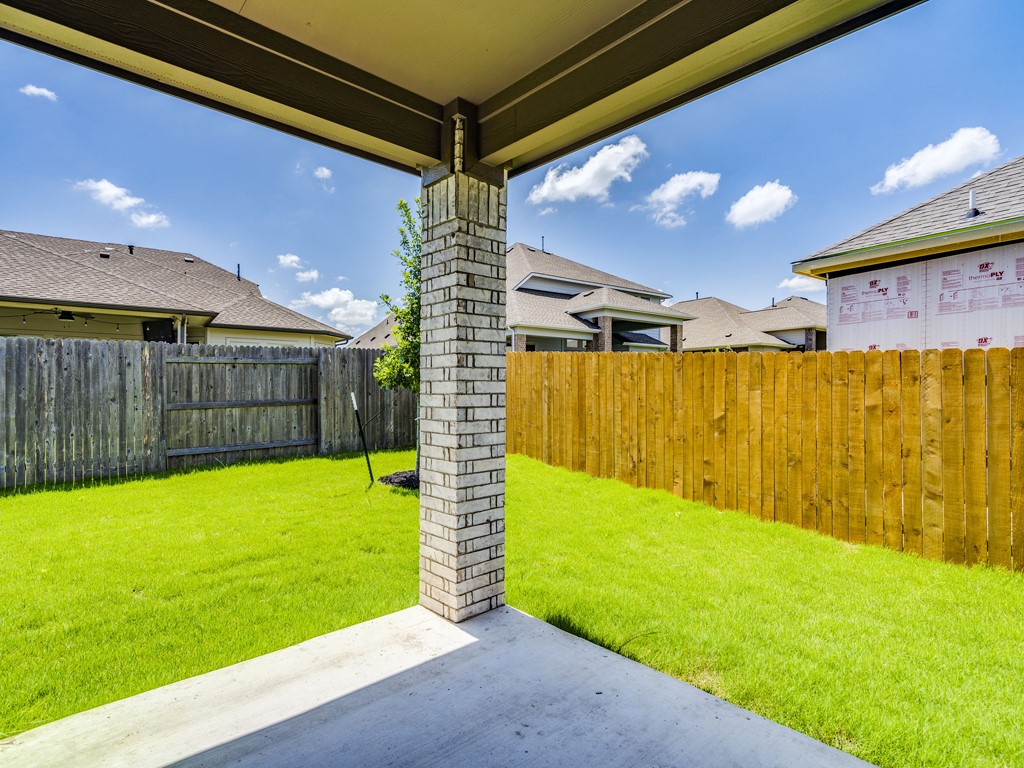4113 Birdwatch Loop, Unit 21 Pflugerville, TX 78660 - Photo 24 of 30 a view of a backyard with a garden
