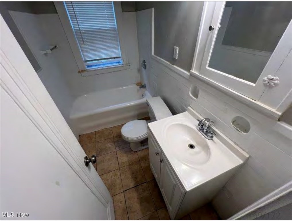 3579 Riedham Road Cleveland, OH 44120 - Photo 9 of 13 Full bathroom featuring vanity, toilet, shower / bathtub combination, and tile patterned flooring