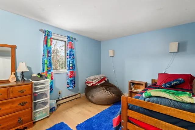 a room with toys and a wooden floor