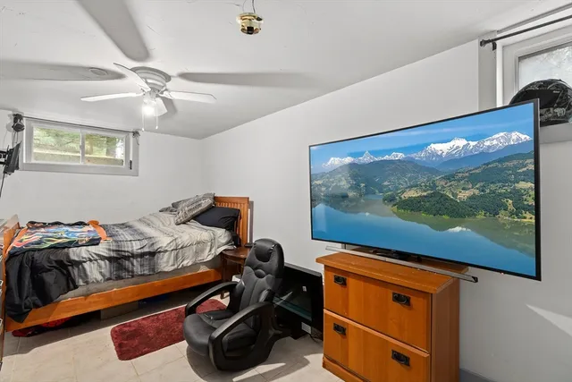 a room with furniture and screen