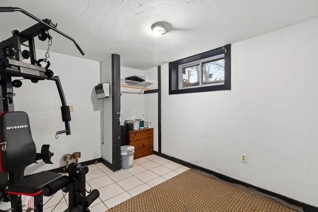 a view of a livingroom with storage and utility