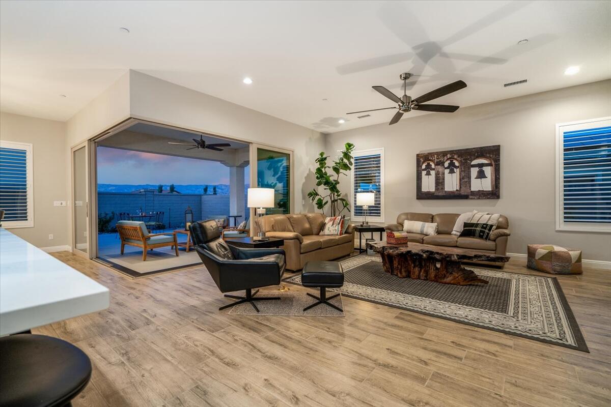 24 Claret Road Rancho Mirage, CA 92270 - Photo 25 of 34 a living room with furniture and a wooden floor