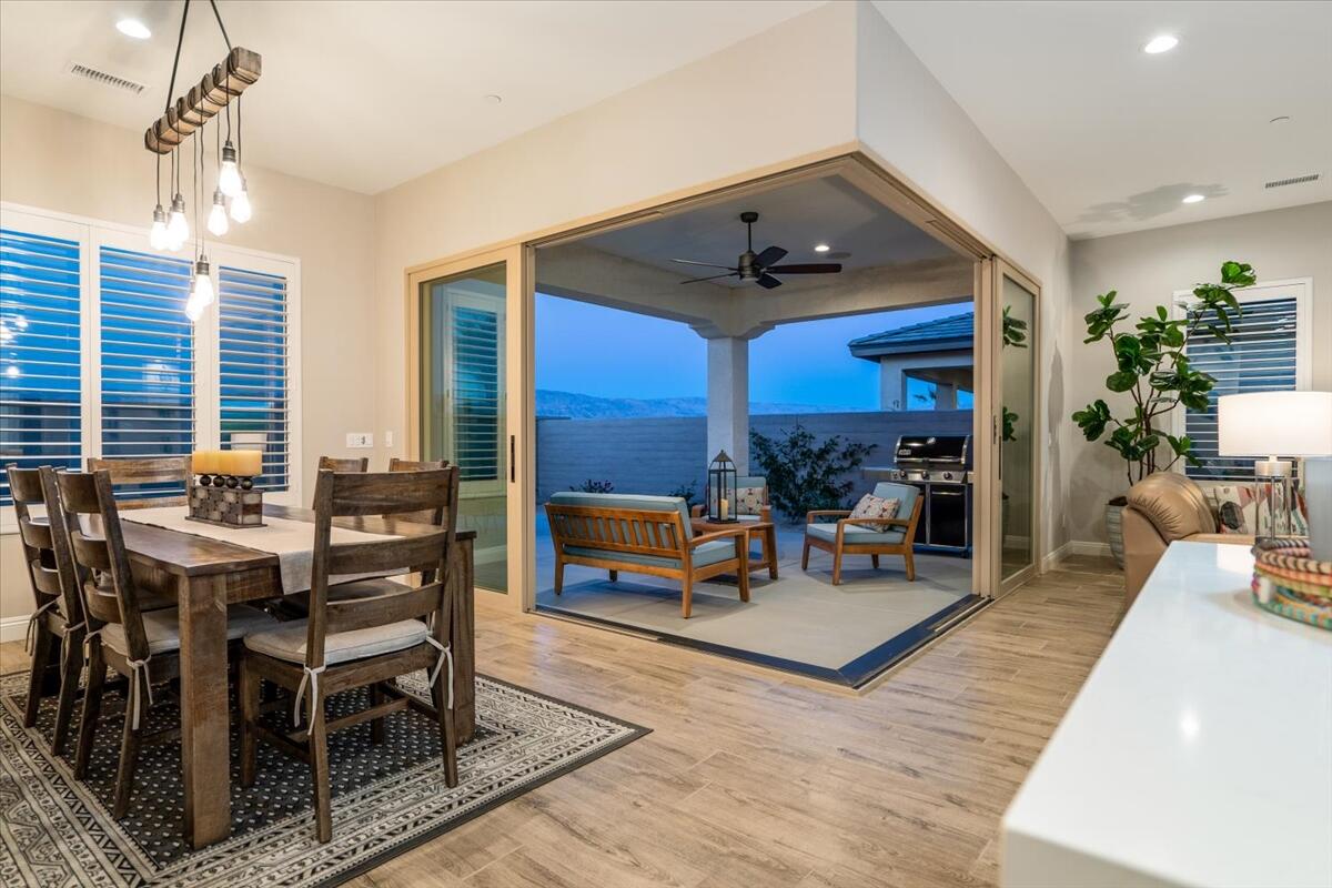 24 Claret Road Rancho Mirage, CA 92270 - Photo 26 of 34 a living room with furniture and wooden floor