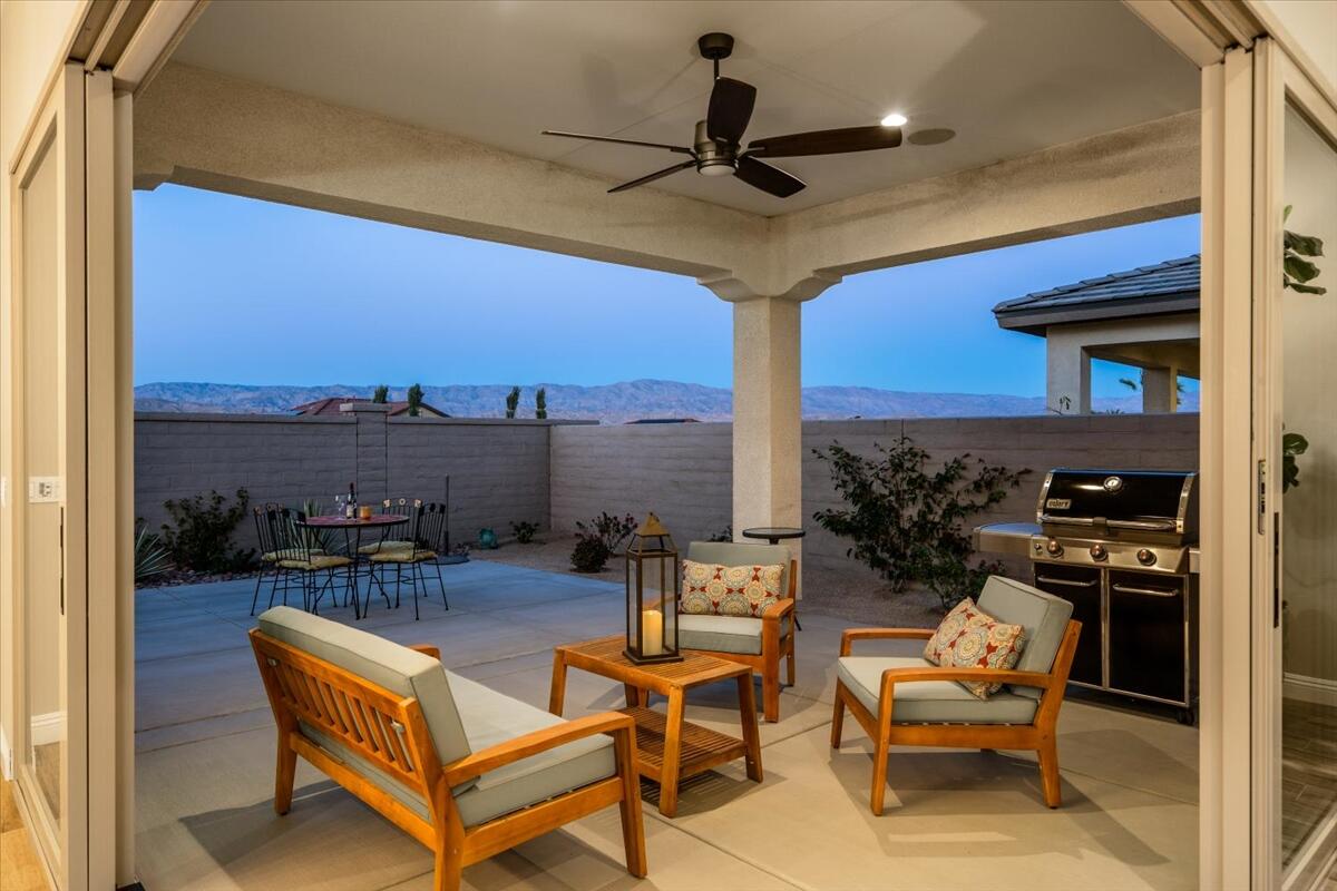 24 Claret Road Rancho Mirage, CA 92270 - Photo 28 of 34 a view of a terrace with furniture and a potted plant