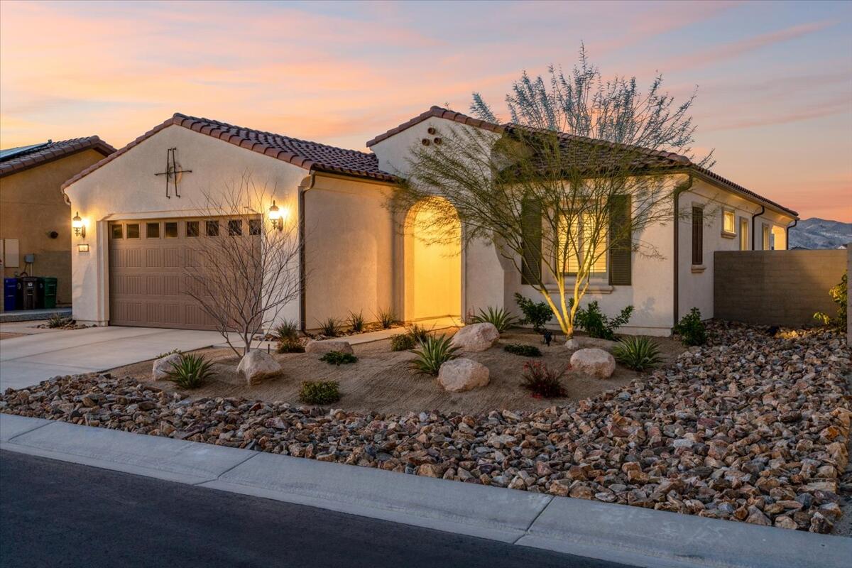 24 Claret Road Rancho Mirage, CA 92270 - Photo 29 of 34 a group of couches under an umbrella