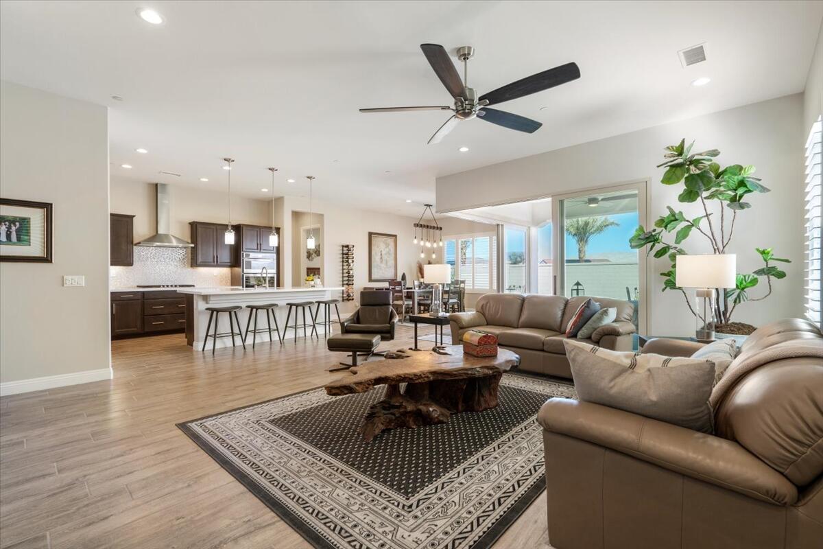 24 Claret Road Rancho Mirage, CA 92270 - Photo 6 of 34 a living room with furniture and a view of kitchen