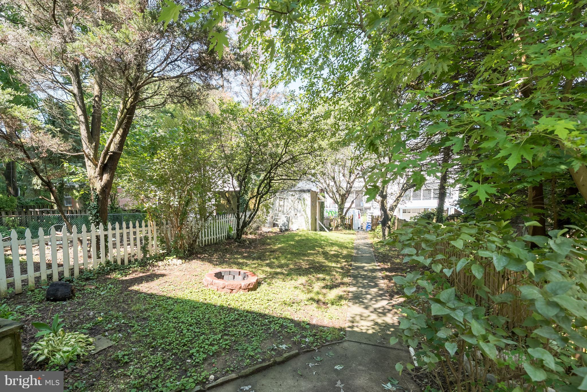 58 Burkleigh Road Baltimore, MD 21286 - Photo 19 of 23 a view of a yard with plants and trees