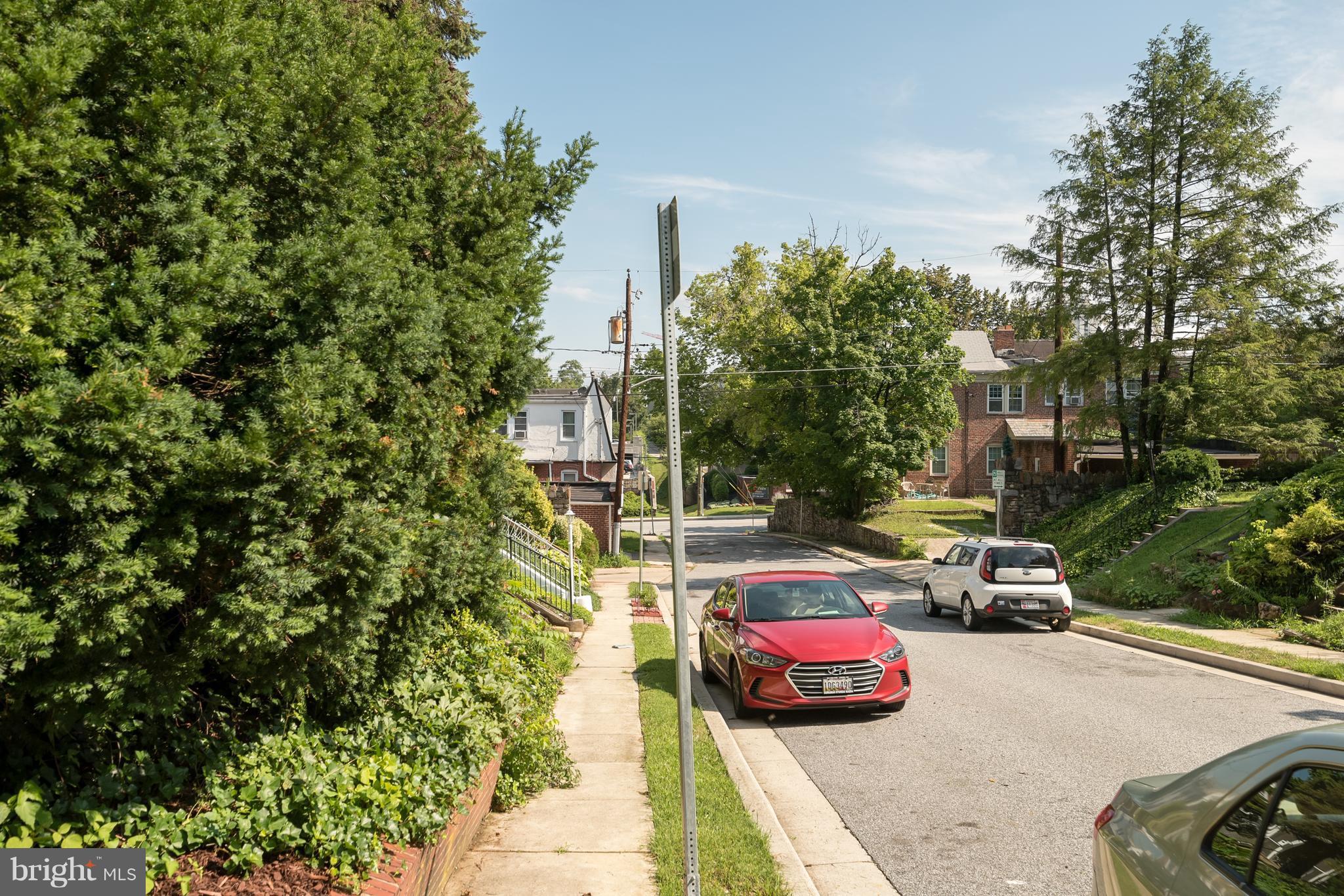 58 Burkleigh Road Baltimore, MD 21286 - Photo 22 of 23 a car parked on the side of the road