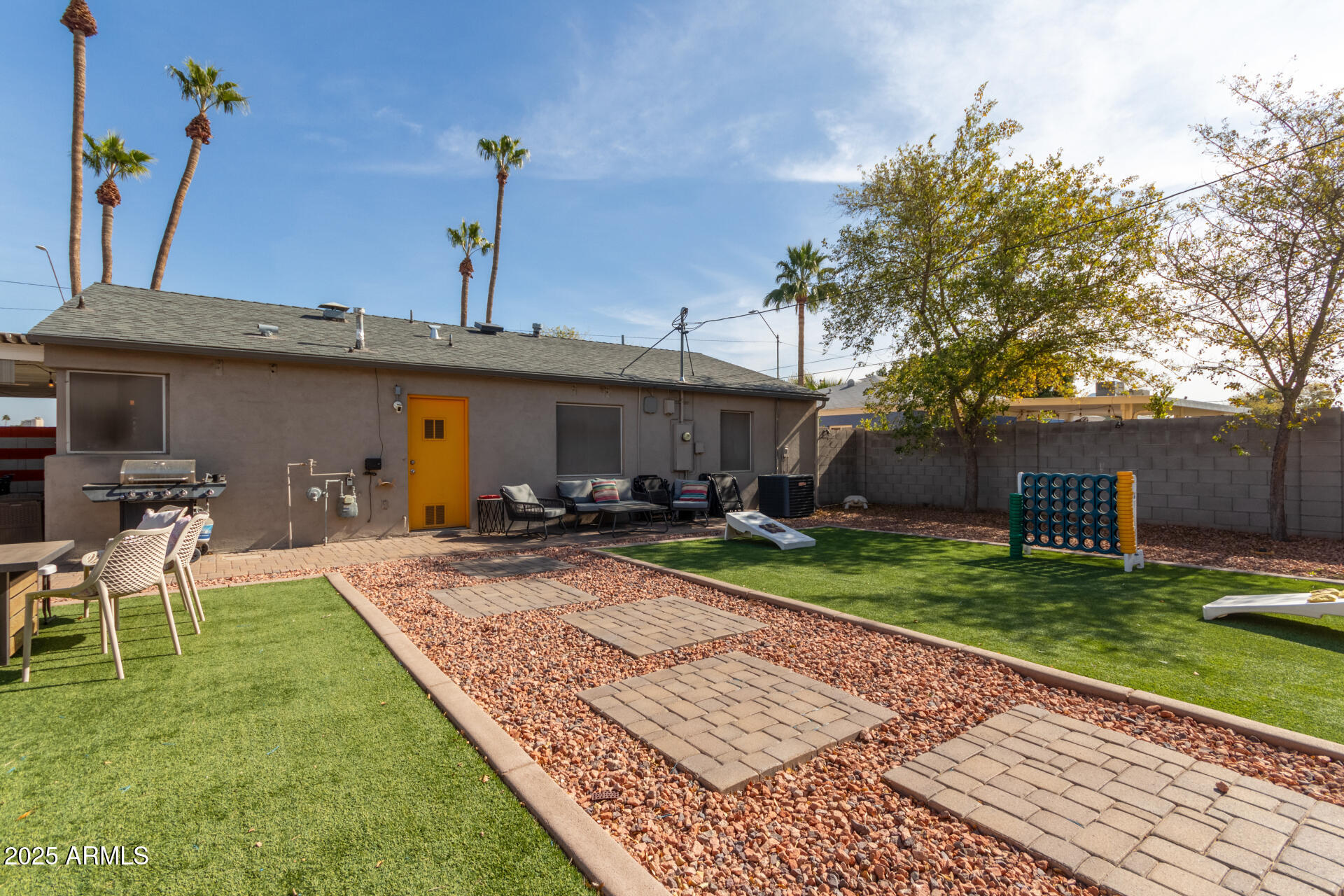 3132 North 15th Avenue Phoenix, AZ 85015 - Photo 26 of 28 a view of a house with backyard and sitting area