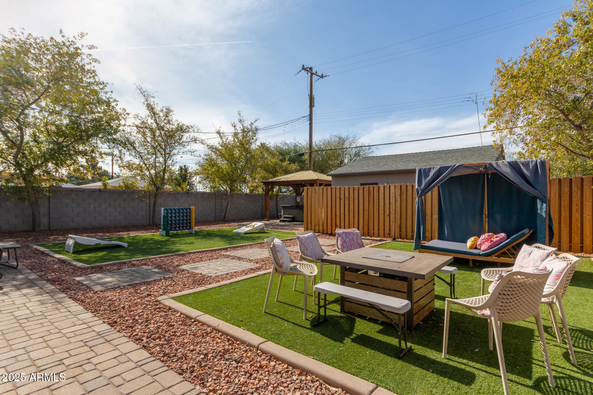 3132 North 15th Avenue Phoenix, AZ 85015 - Photo 27 of 28 a table and chairs in the patio