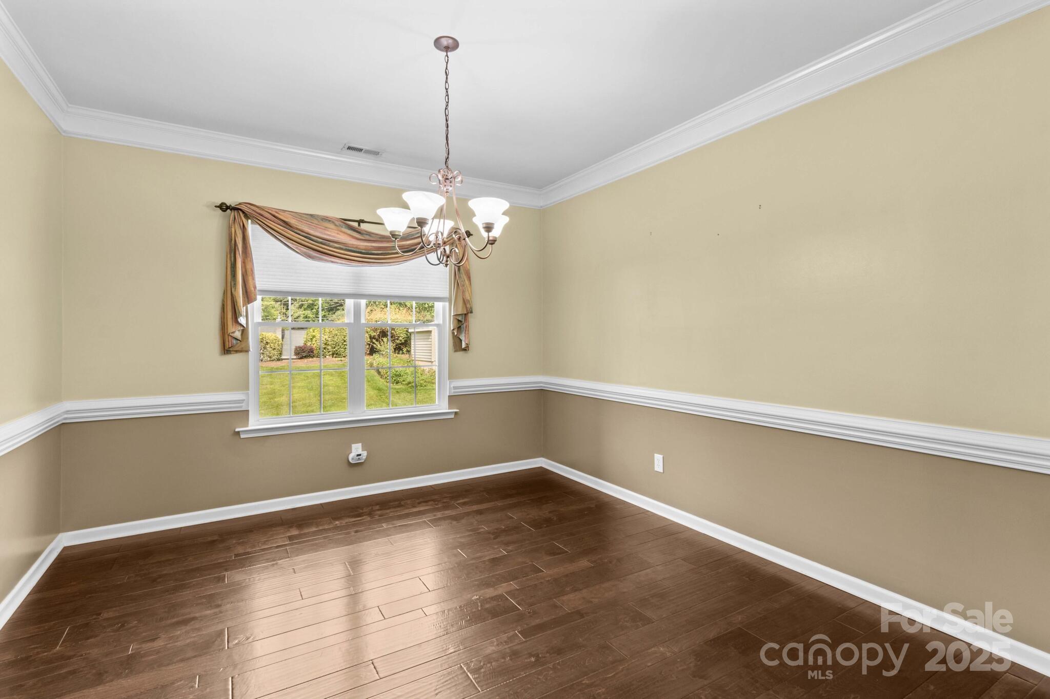 124 Elizabeth Hearth Road Mooresville, NC 28115 - Photo 12 of 48 a view of room with window and wooden floor
