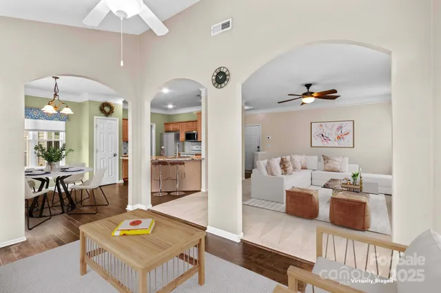 a living room with furniture and a table