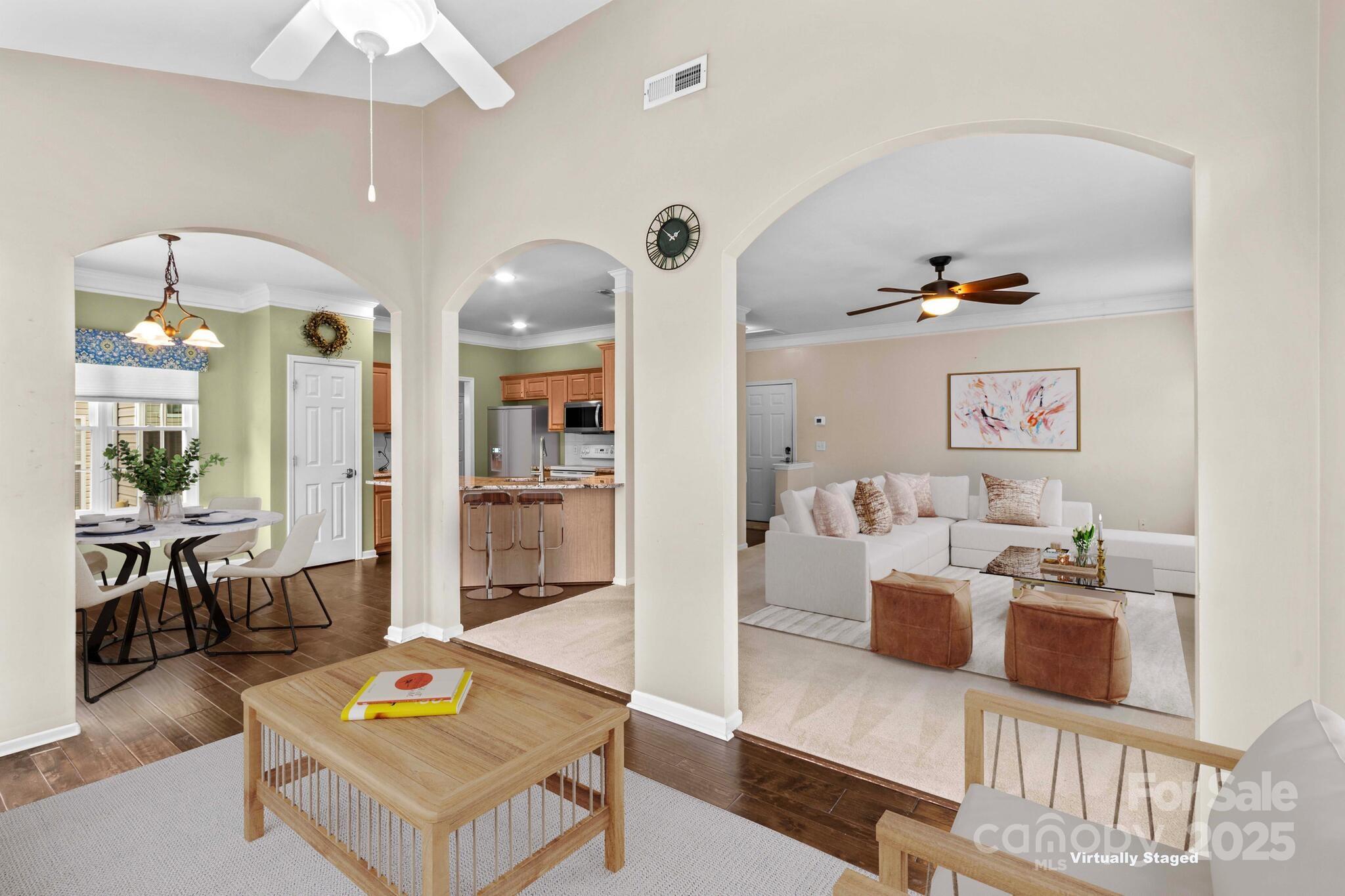 124 Elizabeth Hearth Road Mooresville, NC 28115 - Photo 20 of 48 a living room with furniture and a table