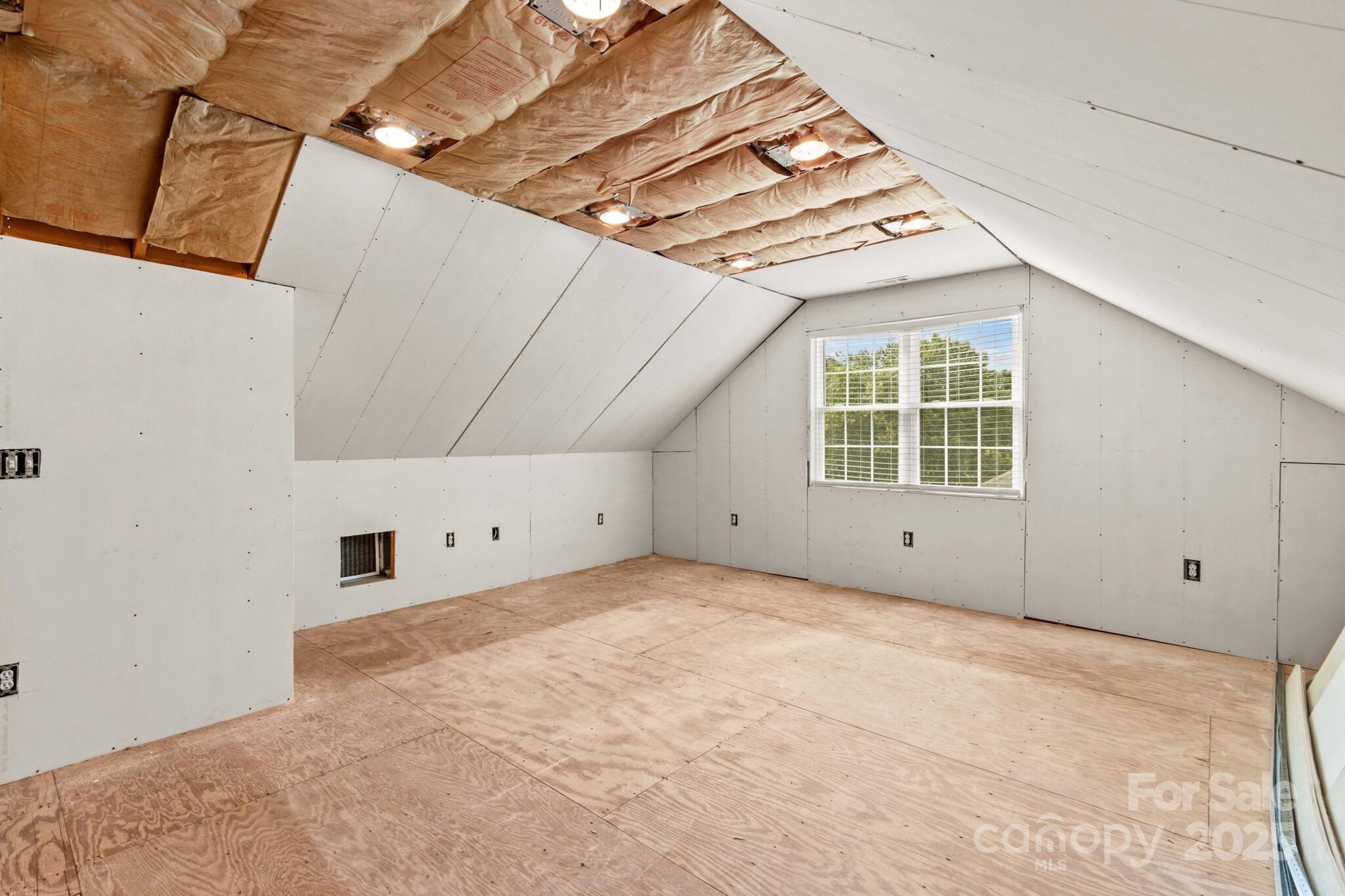 124 Elizabeth Hearth Road Mooresville, NC 28115 - Photo 41 of 48 a view of a room with an empty space