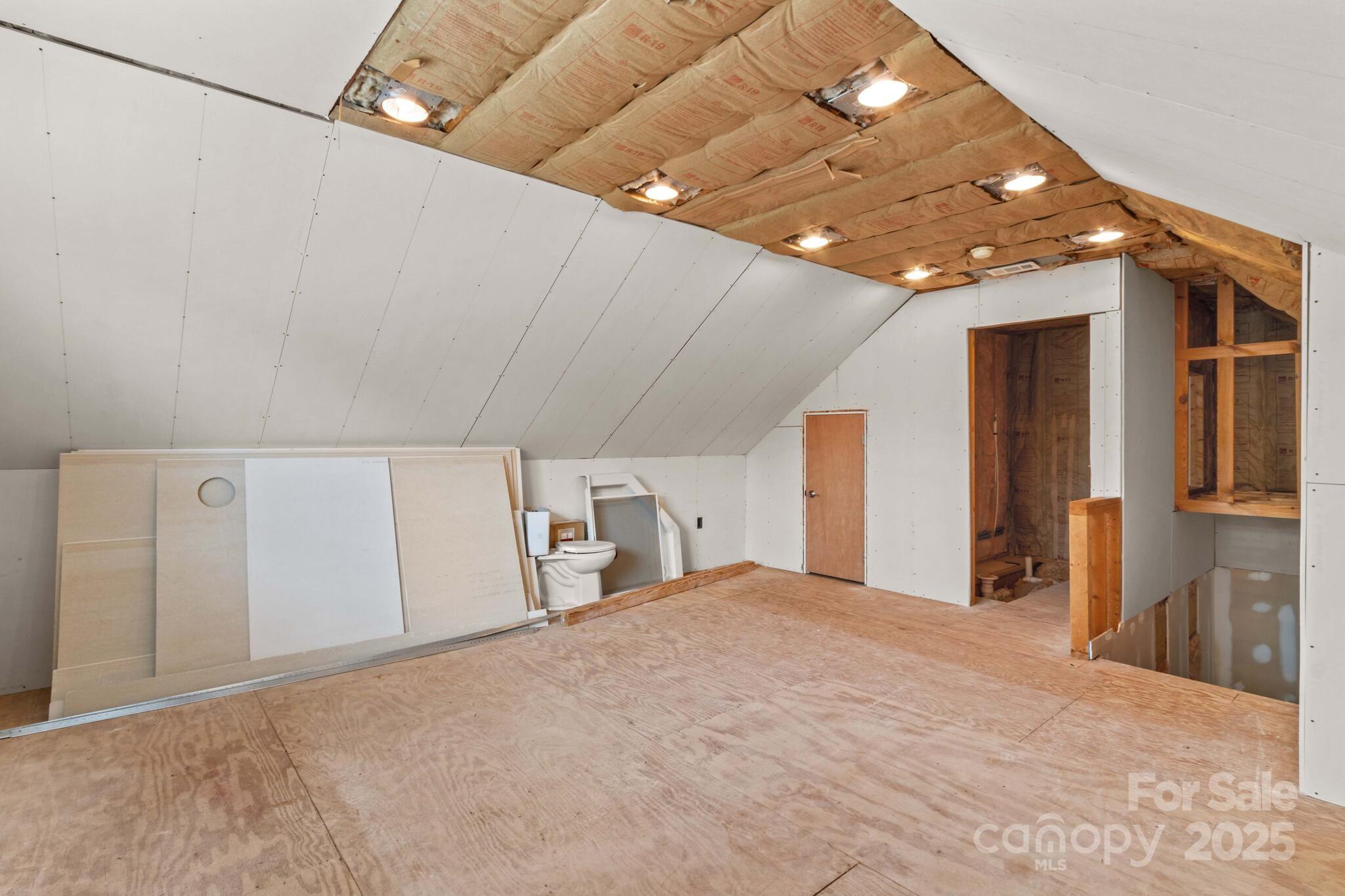 124 Elizabeth Hearth Road Mooresville, NC 28115 - Photo 43 of 48 a big room with closet and chandelier